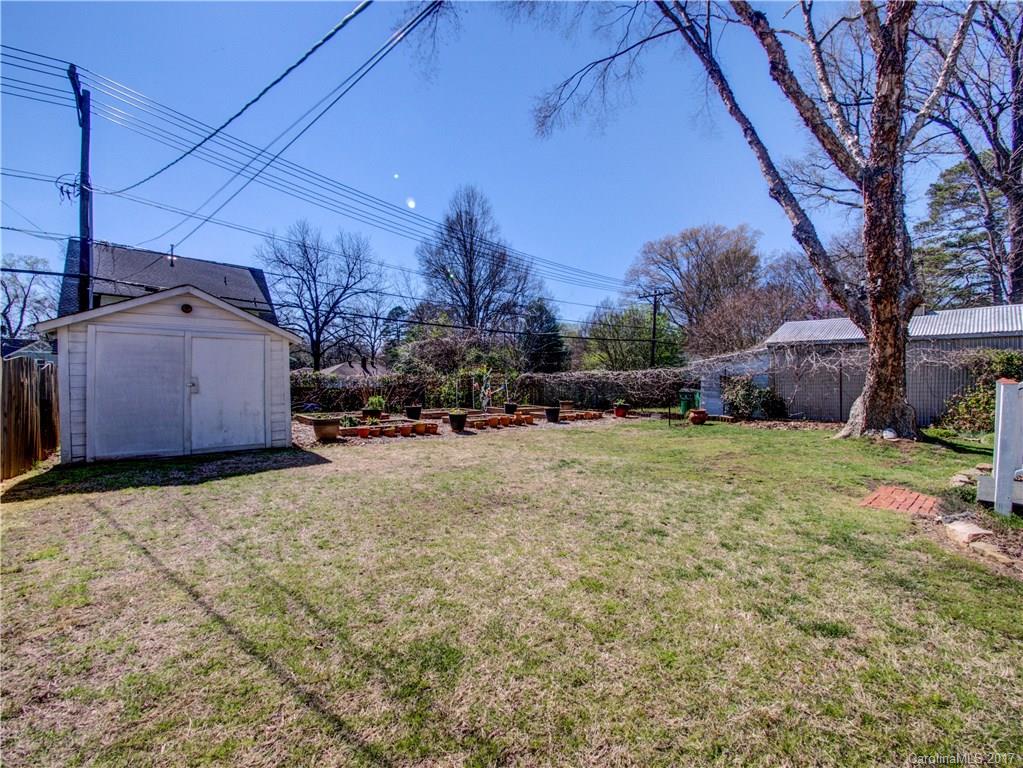 2412 Laburnum Avenue Charlotte, NC 28205 - Photo 20 of 24 a view of a yard with cars