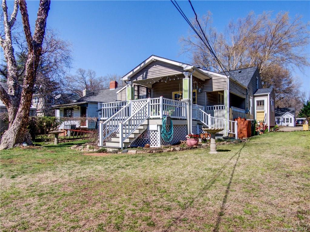 2412 Laburnum Avenue Charlotte, NC 28205 - Photo 24 of 24 a view of a house with a yard and sitting area