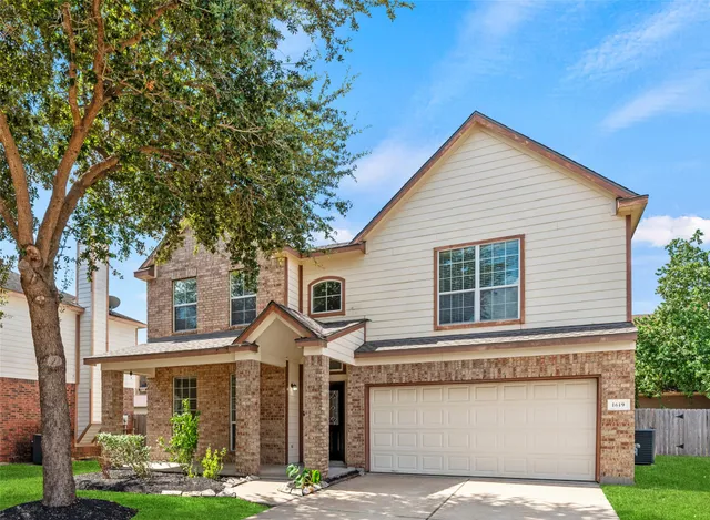 a picture of a bathroom with a shower