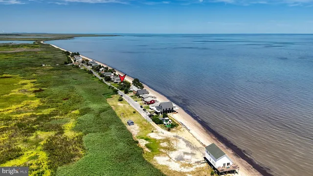 a view of a lake with a building in the back