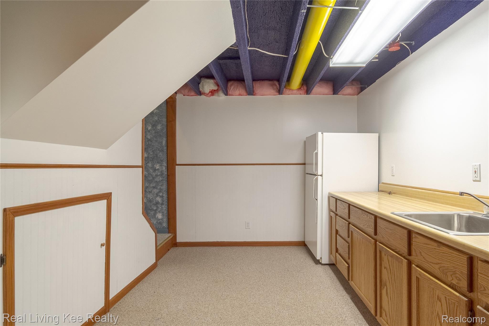 2200 Rochelle Park Drive Rochester, MI 48309 - Photo 36 of 49 Finished Basement with Wet Bar and Refrigerator