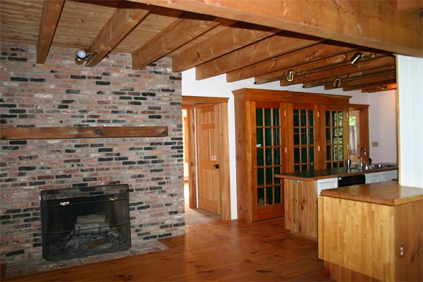 198 Prospect Hill Road Harvard, MA 01451 - Photo 3 of 21 a room with fireplace and wooden floor