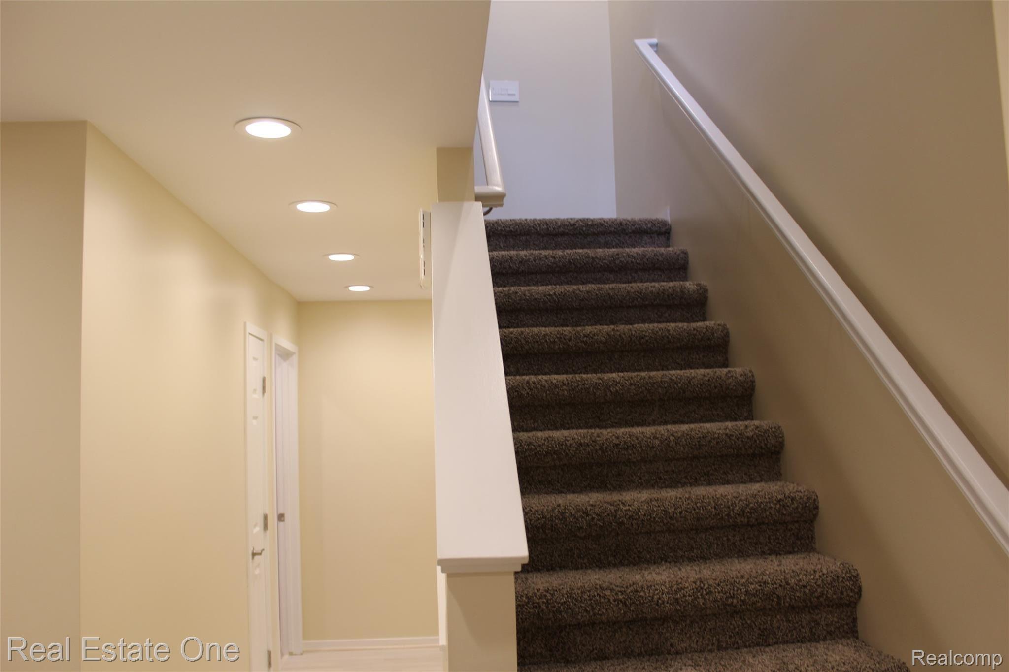 744 Eastbridge Court, Unit 103 Rochester, MI 48307 - Photo 8 of 23 Loft stairway.JPG