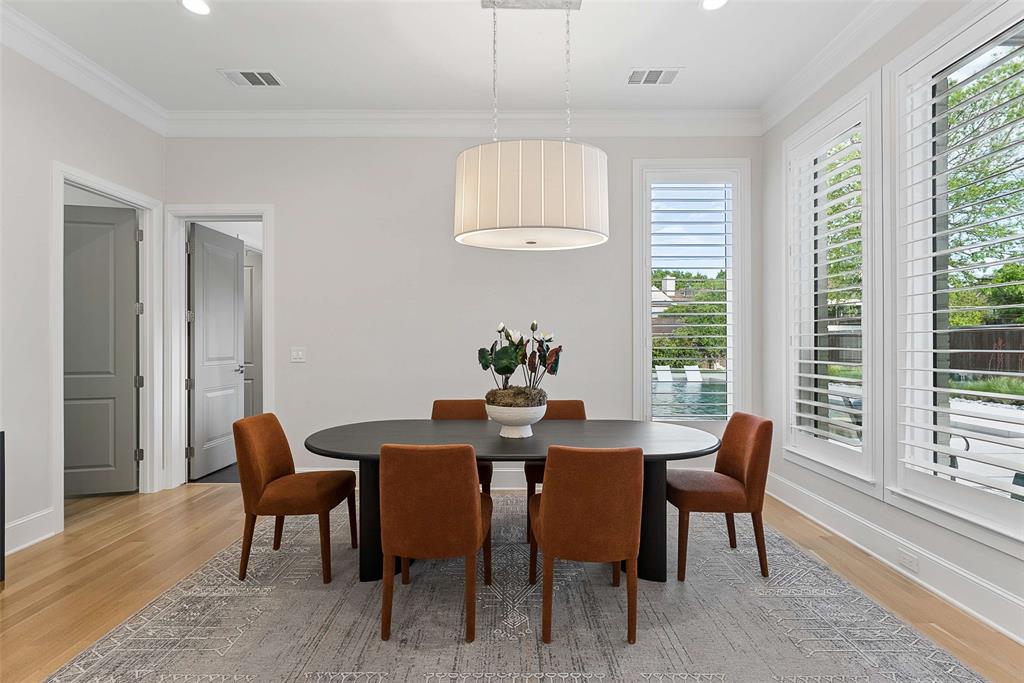 7110 Robin Road Dallas, TX 75209 - Photo 14 of 36 a view of a dining room with furniture window and outside view