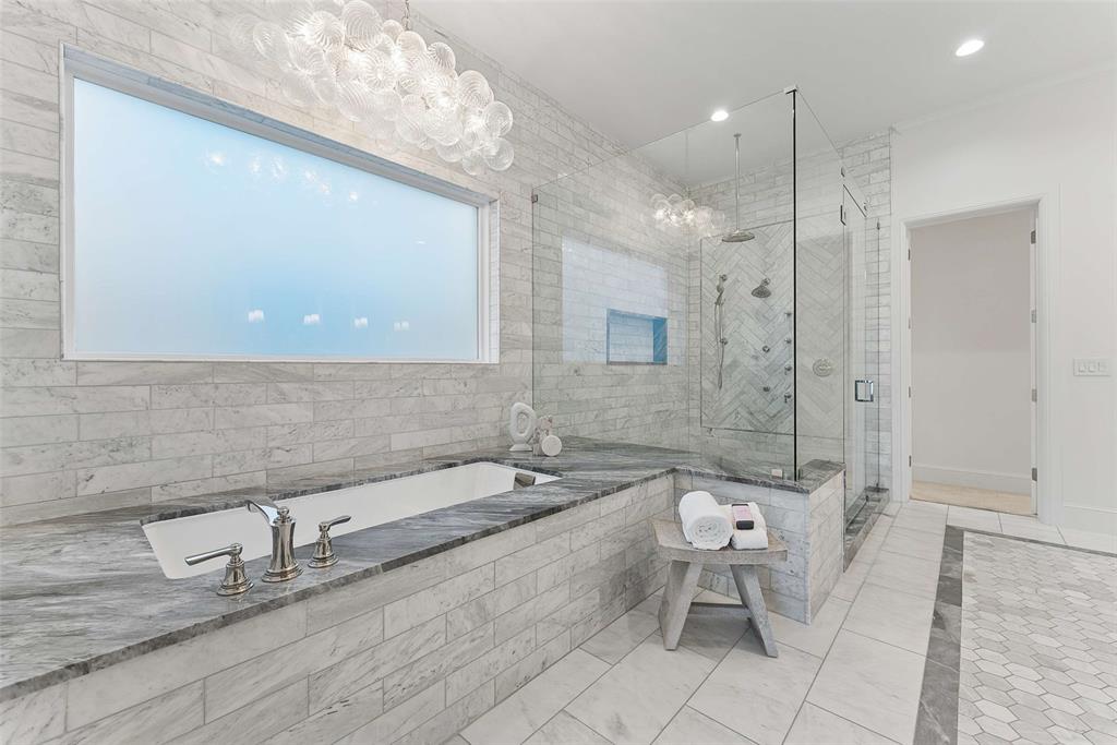 7110 Robin Road Dallas, TX 75209 - Photo 19 of 36 a bathroom with a granite countertop sink a toilet and shower