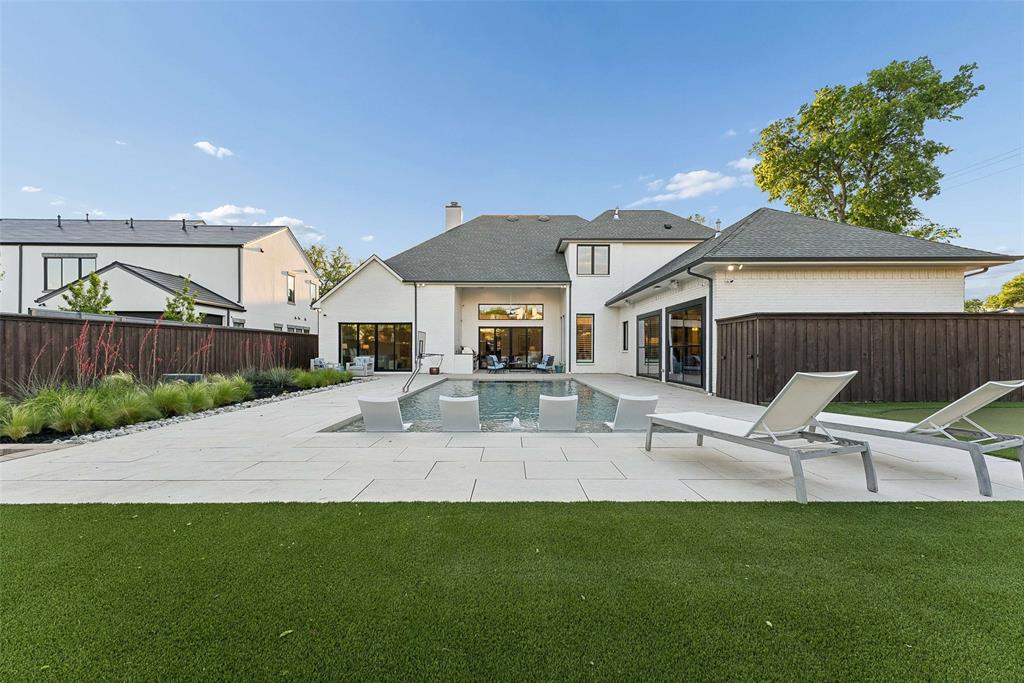 7110 Robin Road Dallas, TX 75209 - Photo 25 of 36 a front view of a house with a yard