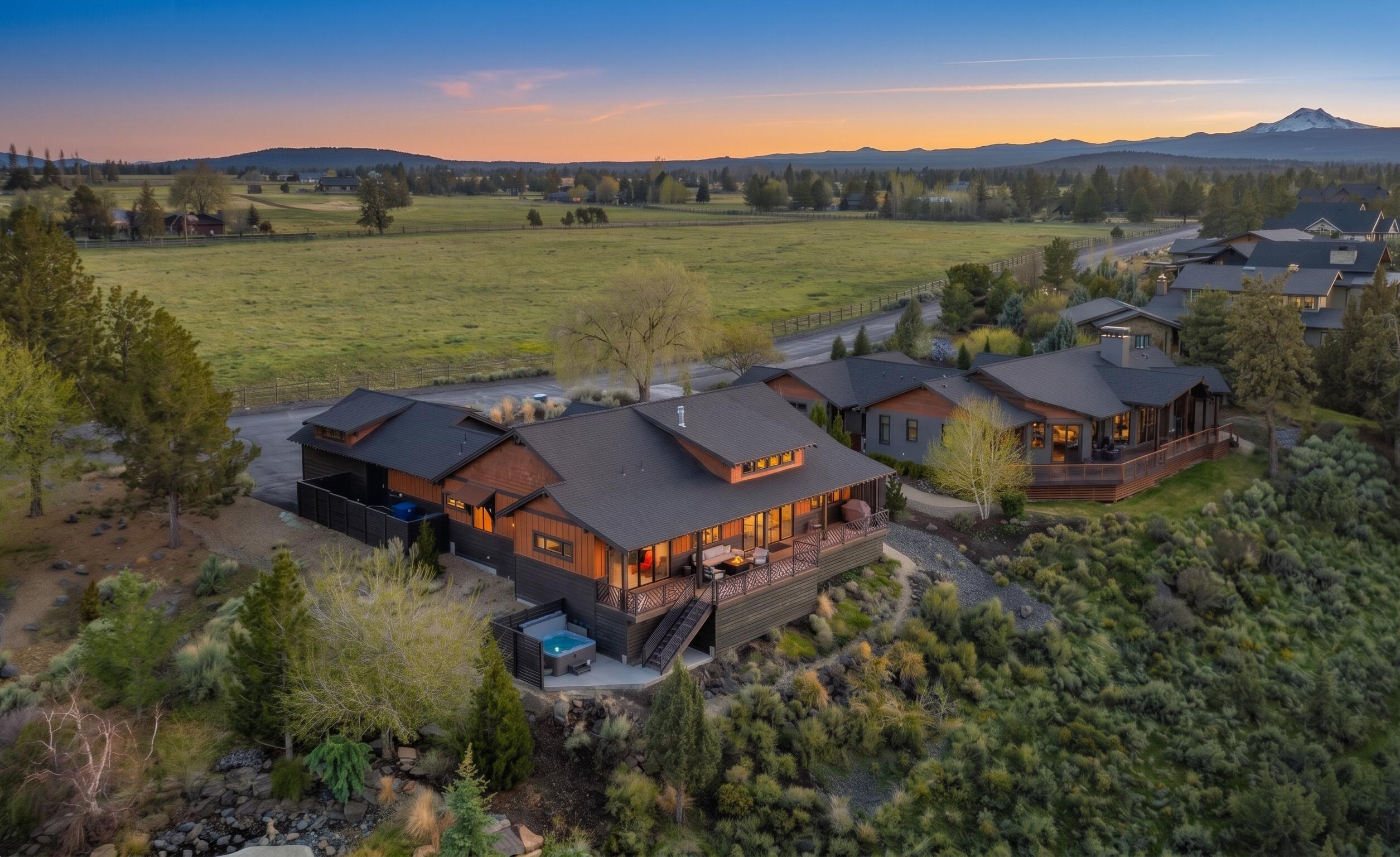 20350 Rock Canyon Road Bend, OR 97703 - Photo 2 of 47 an aerial view of a house with pool and a yard