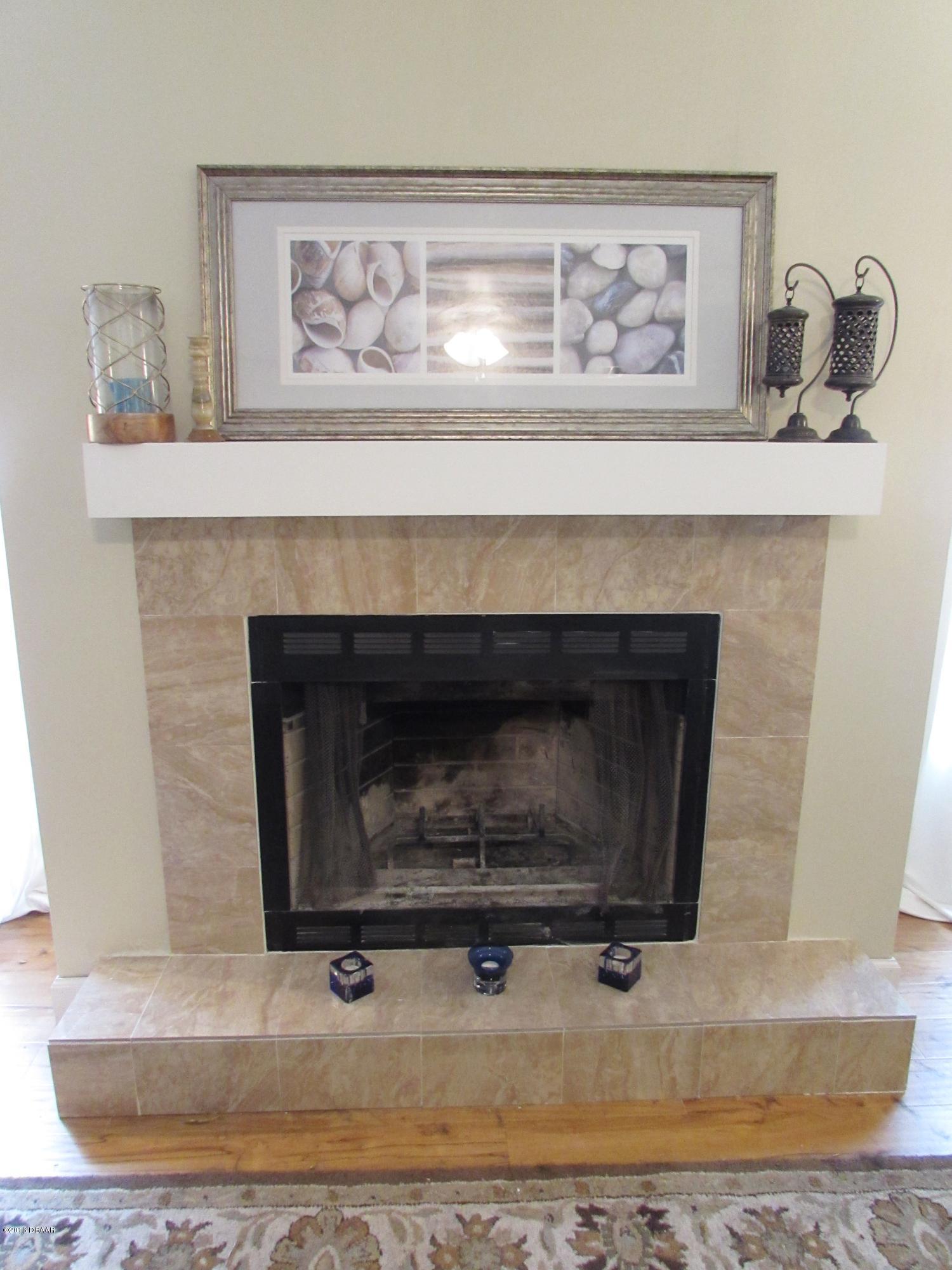 616 Vaughn Road Port Orange, FL 32127 - Photo 7 of 17 Newly Tiled Fireplace