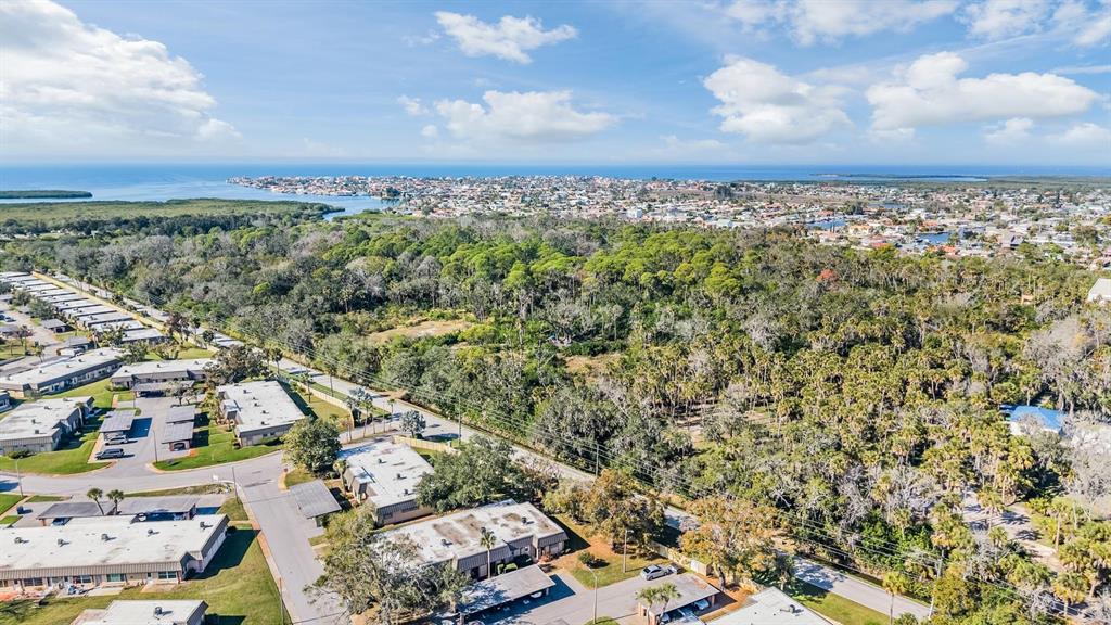 4450 Sunstate Drive New Port Richey, FL 34652 - Photo 28 of 29 an aerial view of multiple house