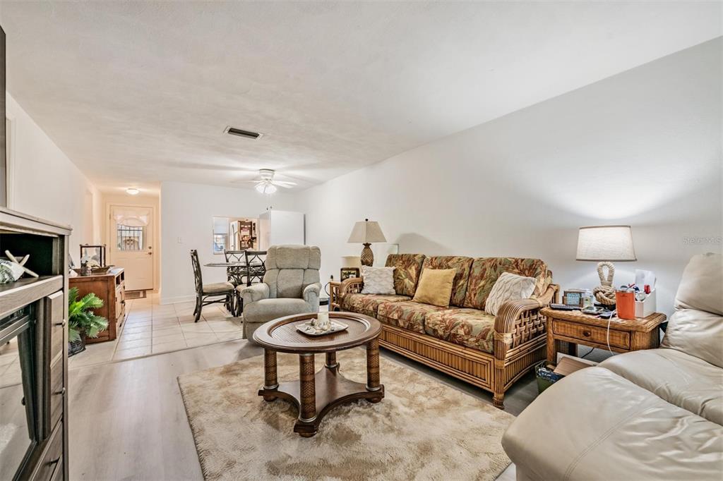 4450 Sunstate Drive New Port Richey, FL 34652 - Photo 4 of 29 a living room with furniture and a couch