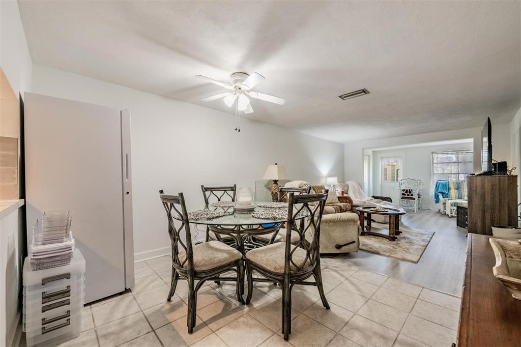 4450 Sunstate Drive New Port Richey, FL 34652 - Photo 5 of 29 a view of a dining room with furniture