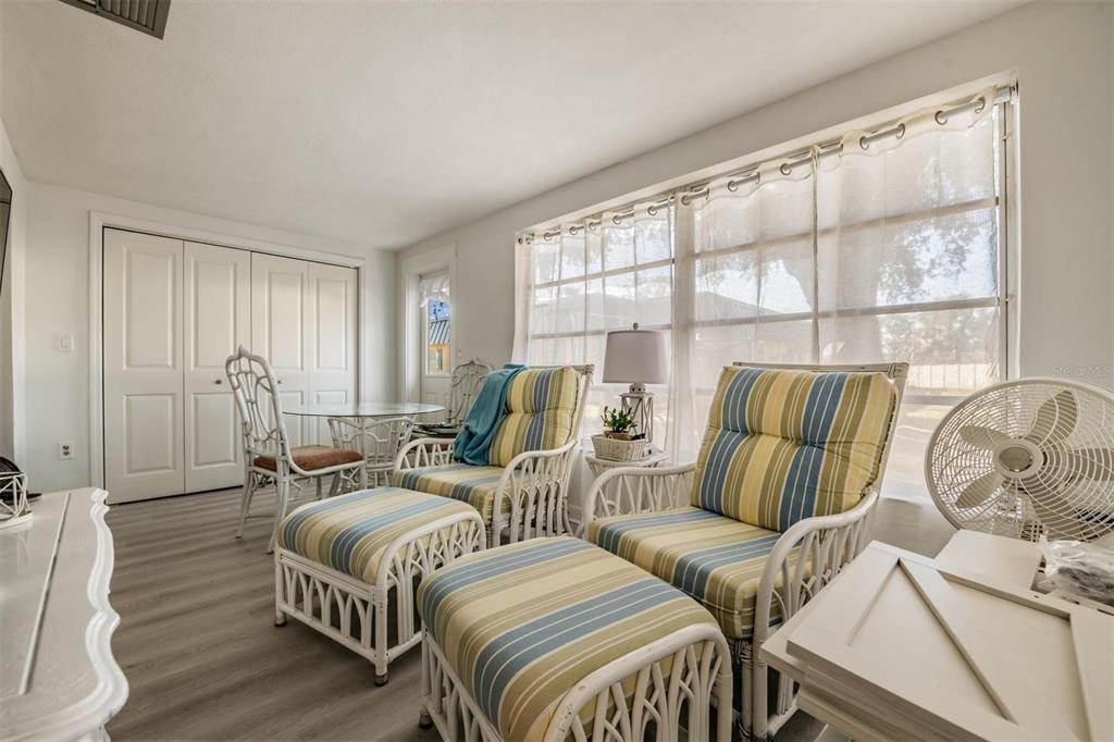 4450 Sunstate Drive New Port Richey, FL 34652 - Photo 8 of 29 a living room with furniture and a window