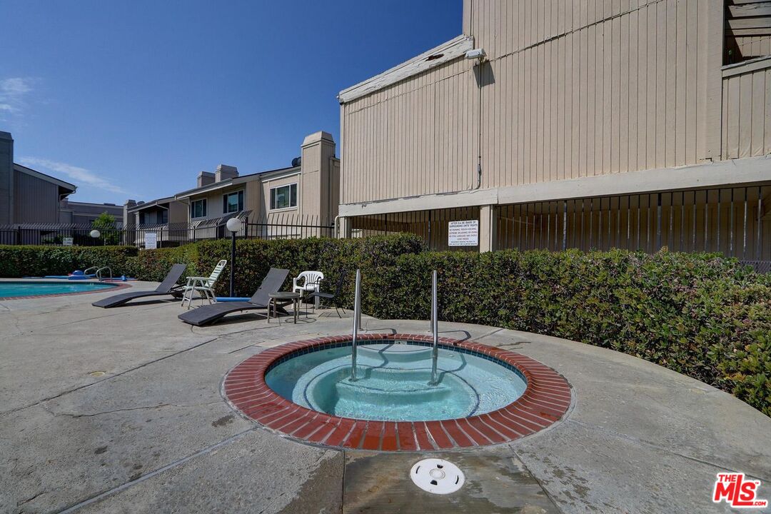 1275 Seacliff Court, Unit 5 Ventura, CA 93003 - Photo 17 of 25 a view of a patio with furniture and a fire pit