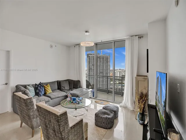 a view of a workspace with furniture