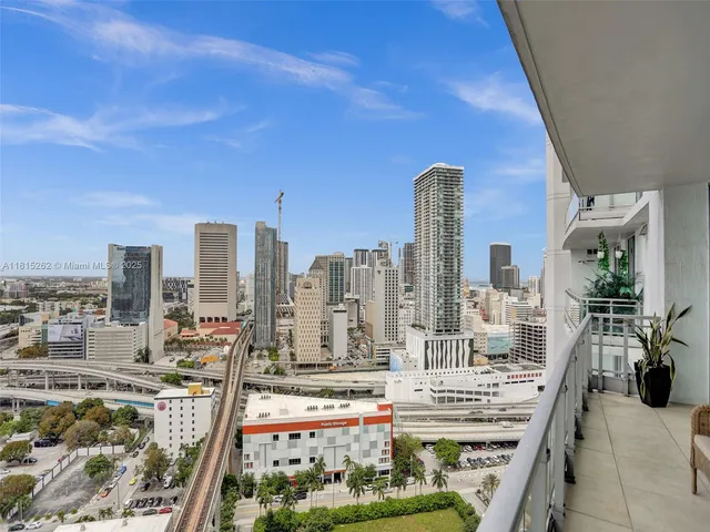 a view of a city with tall buildings