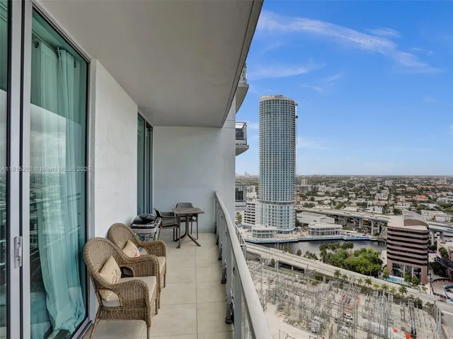 a view of a city with tall buildings