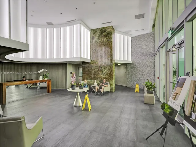 a bathroom with a sink and shower