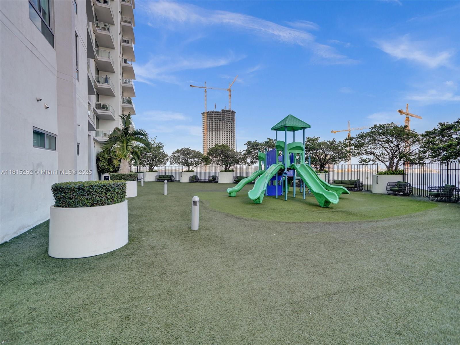 90 Southwest 3rd Street, Unit 2809 Miami, FL 33130 - Photo 43 of 67 a play ground with table and chairs