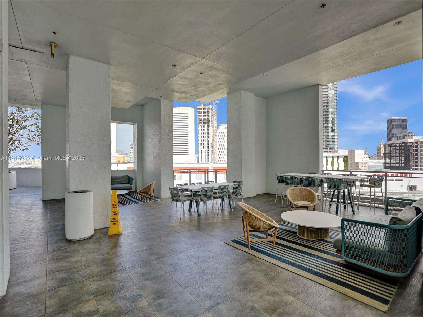 90 Southwest 3rd Street, Unit 2809 Miami, FL 33130 - Photo 46 of 67 a living room with furniture and wooden floor