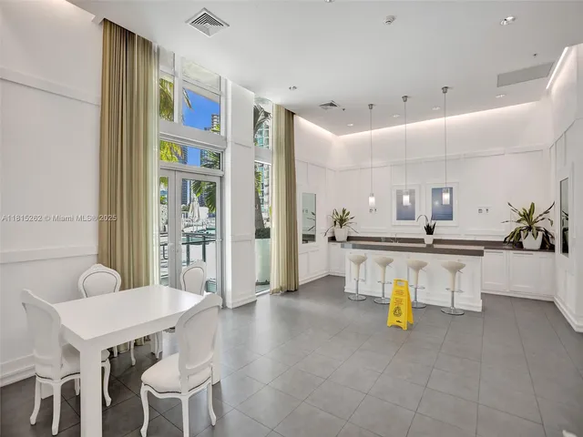 a view of a street with flower plants