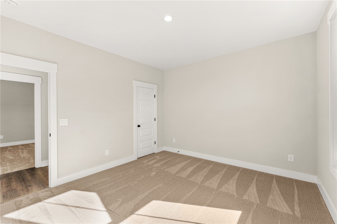 334 Summerall Drive Anderson, SC 29621 - Photo 11 of 28 This versatile room features warm carpet flooring and abundant natural light, perfect for any use.