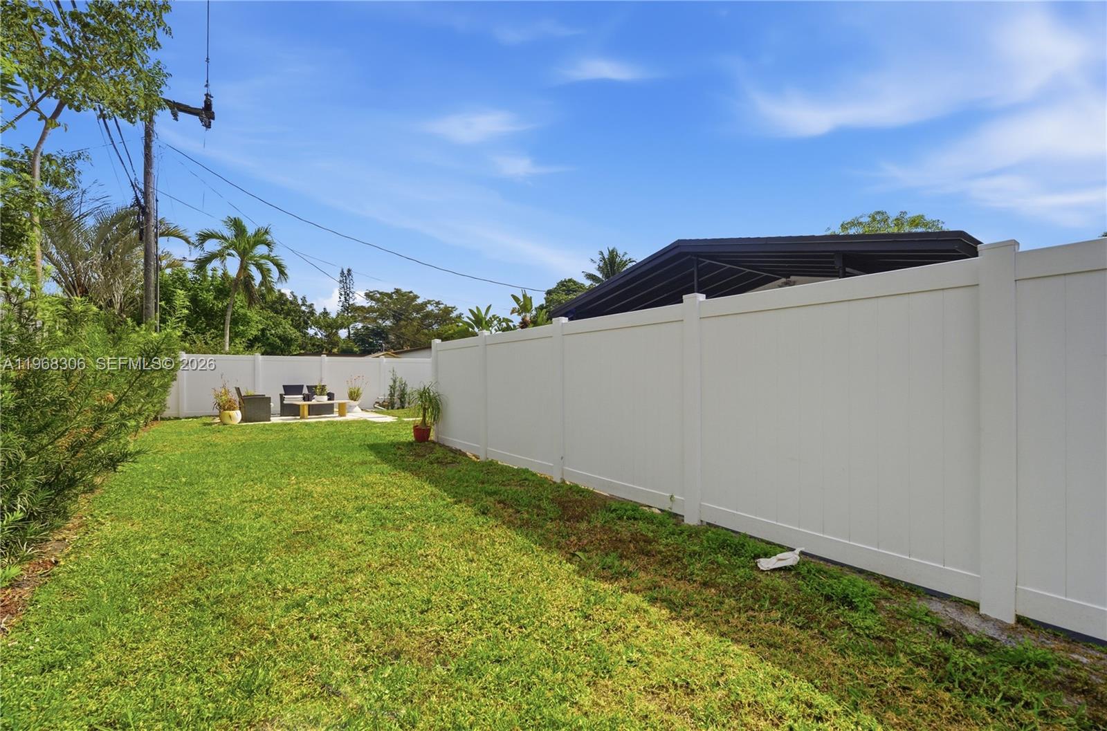 7491 Raleigh Street Hollywood, FL 33024 - Photo 20 of 28 a view of an outdoor space and a yard