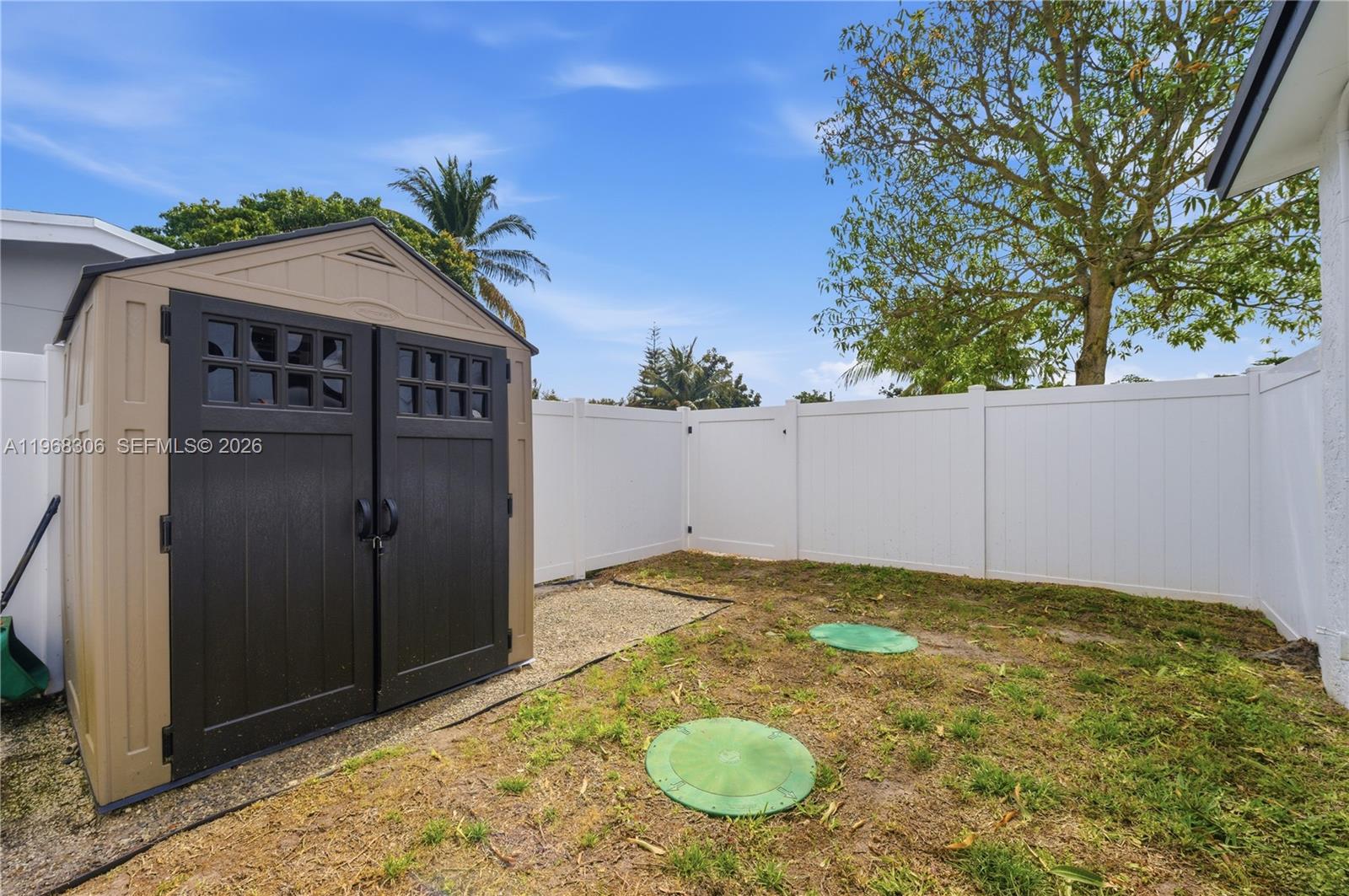 7491 Raleigh Street Hollywood, FL 33024 - Photo 22 of 28 a view of outdoor space and yard