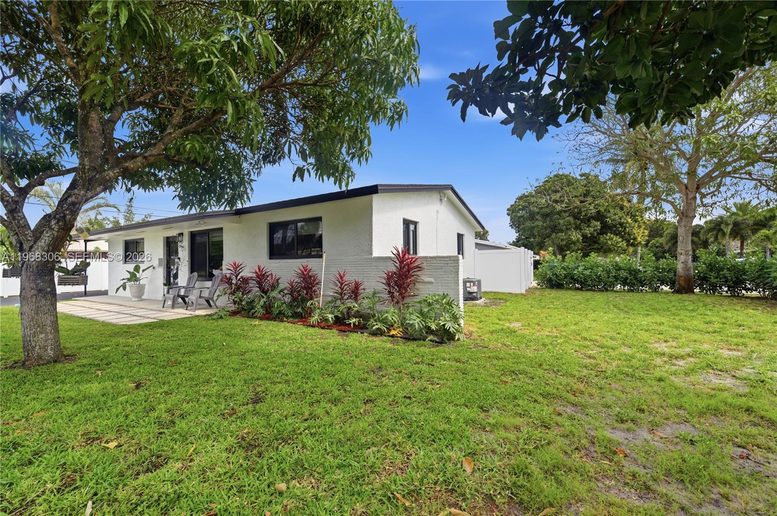 7491 Raleigh Street Hollywood, FL 33024 - Photo 24 of 28 a view of a house with backyard