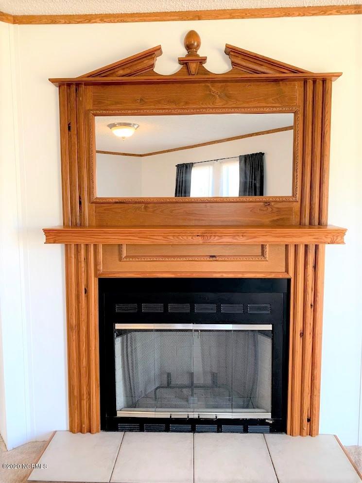 1673 Cool Spring Road Ernul, NC 28527 - Photo 4 of 44 Living Room Fireplace