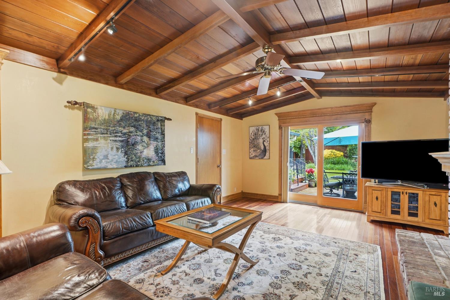 373 Piezzi Road Santa Rosa, CA 95401 - Photo 13 of 55 a living room with furniture and a flat screen tv