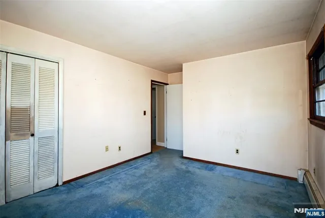 an empty room with closet