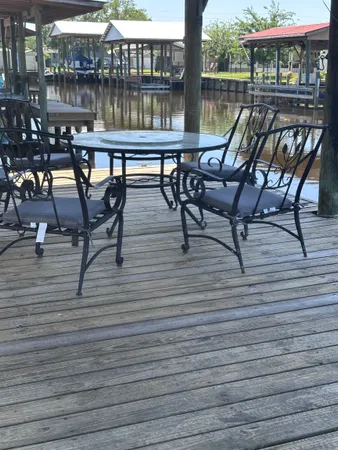 a view of chairs on roof deck