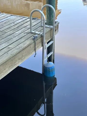 a view of a backyard with sitting area