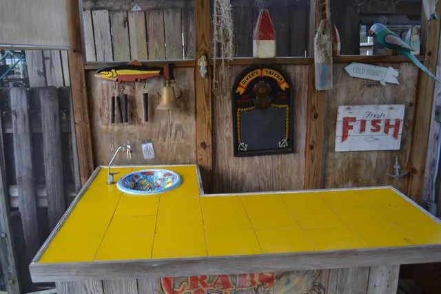 a view of swimming pool with seating area