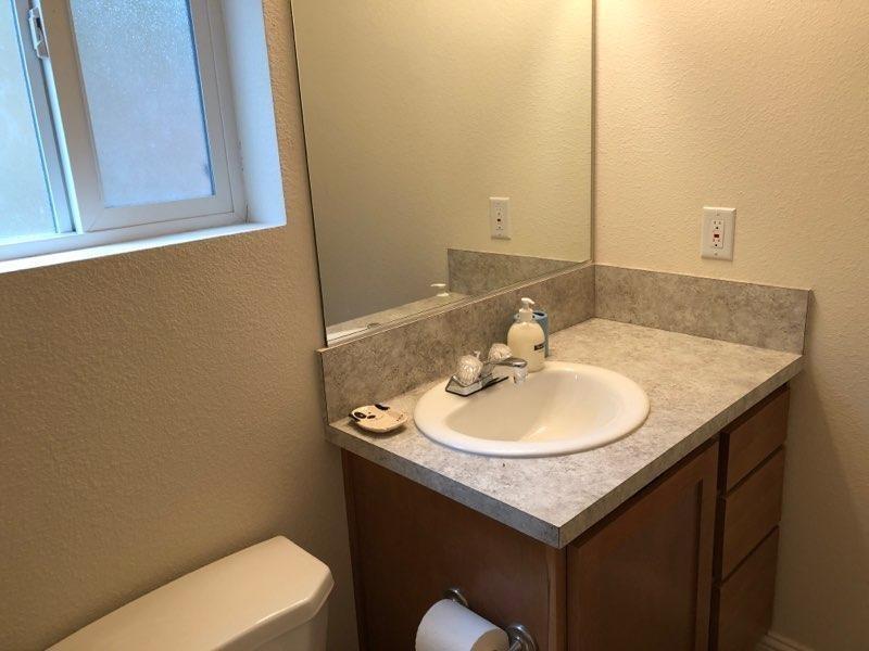 1833 Sams Lane Pollock Pines, CA 95726 - Photo 19 of 23 a bathroom with a sink and a toilet