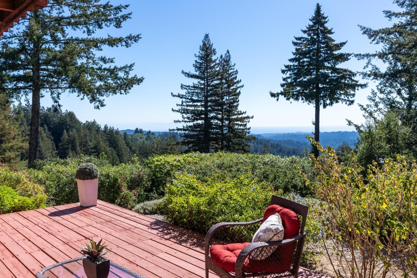 600 Ridge Top Road Los Gatos, CA 95033 - Photo 71 of 81 a wooden bench sitting in backside of a house with a yard