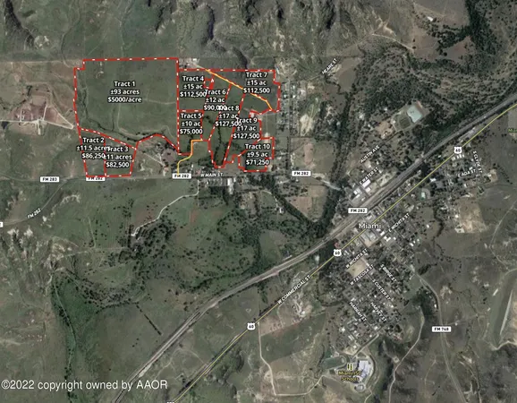 a view of a sign under a tree