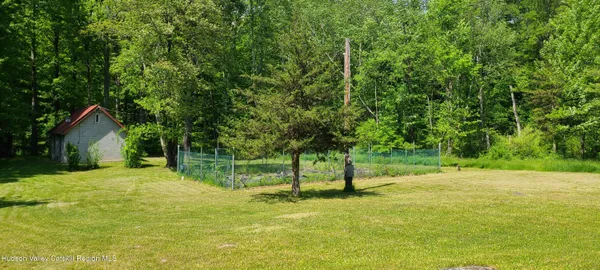 a view of backyard with green space