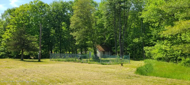 a view of a playground with a trees
