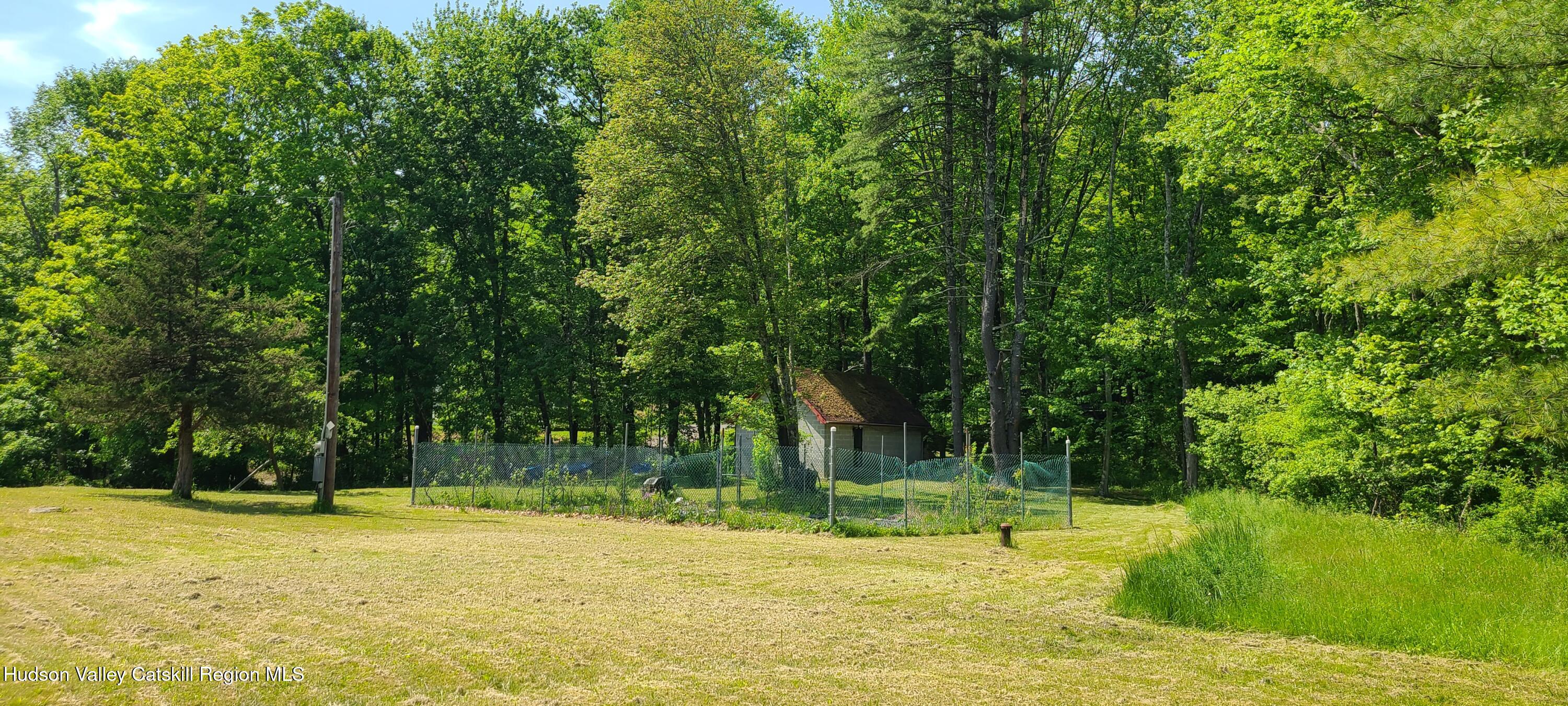71 Dashville Road New Paltz, NY 12561 - Photo 4 of 11 a view of a playground with a trees