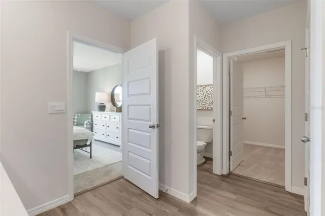 a view of a bathroom from the hallway