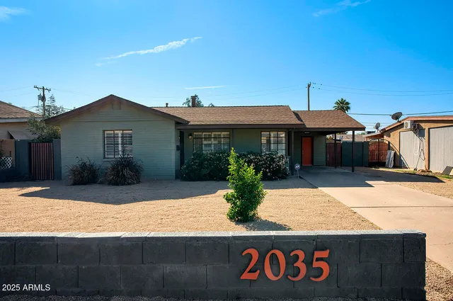 a picture of a bench in front of a window
