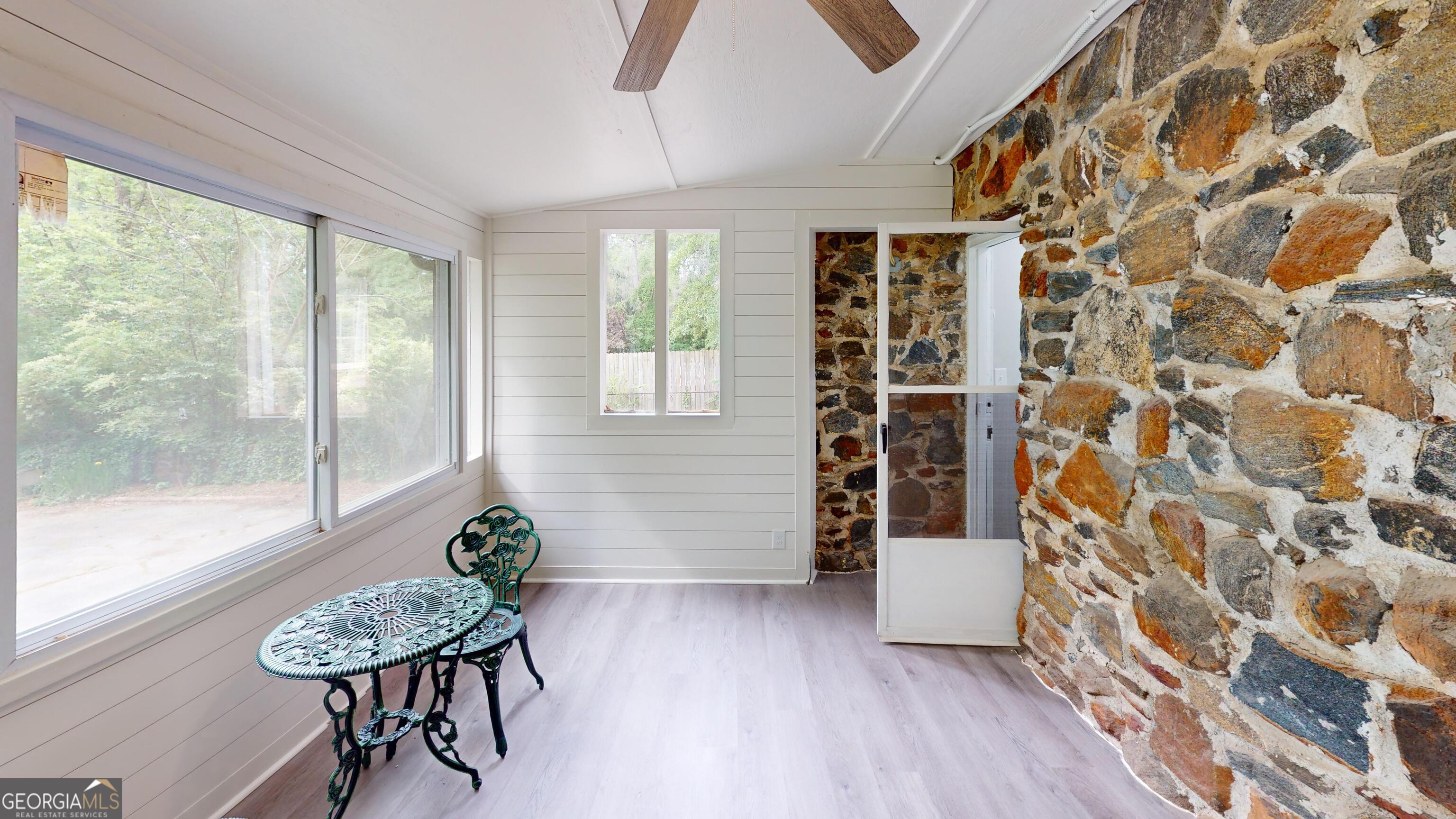 1114 Fayetteville Road Southeast Atlanta, GA 30316 - Photo 18 of 28 a view of a room with furniture and a potted plant