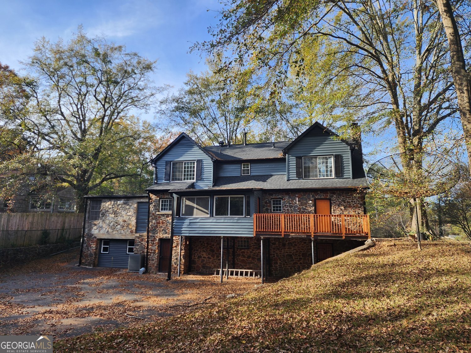 1114 Fayetteville Road Southeast Atlanta, GA 30316 - Photo 24 of 28 a front view of a house with a garden and tree