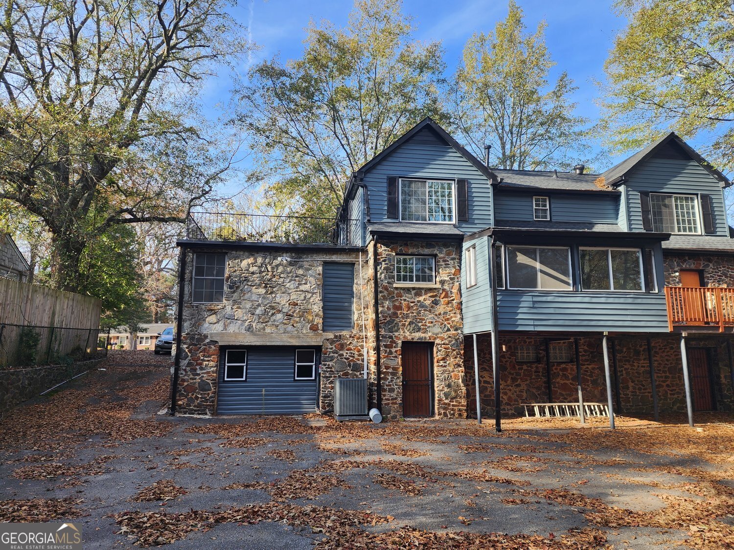 1114 Fayetteville Road Southeast Atlanta, GA 30316 - Photo 25 of 28 a front view of a house with a yard