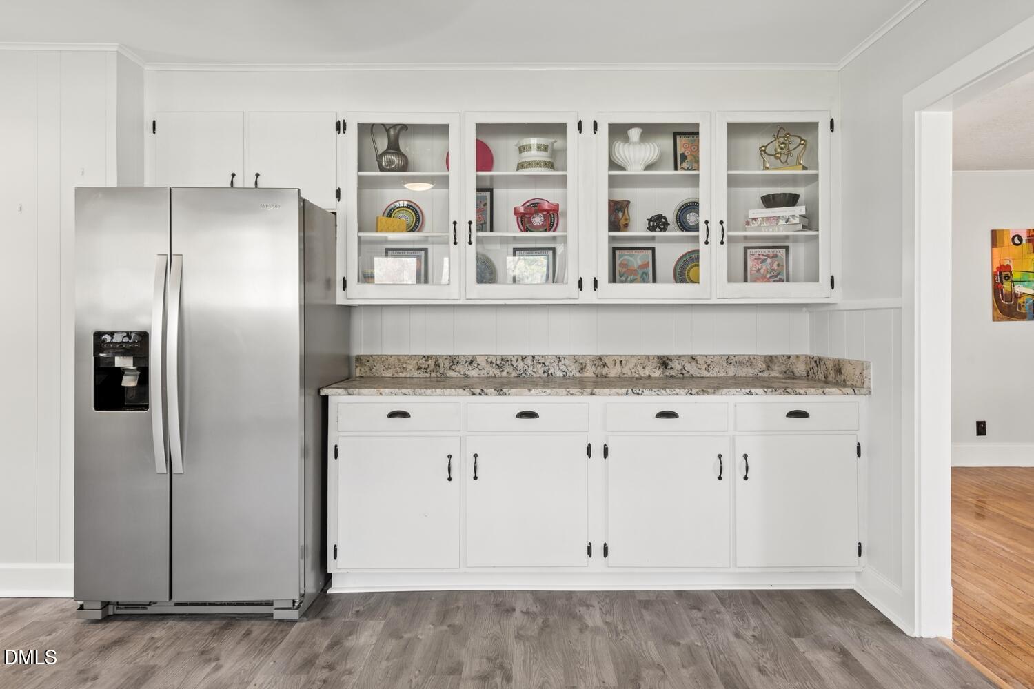 414 South Maple Street Graham, NC 27253 - Photo 6 of 42 a kitchen with stainless steel appliances granite countertop a refrigerator and a stove