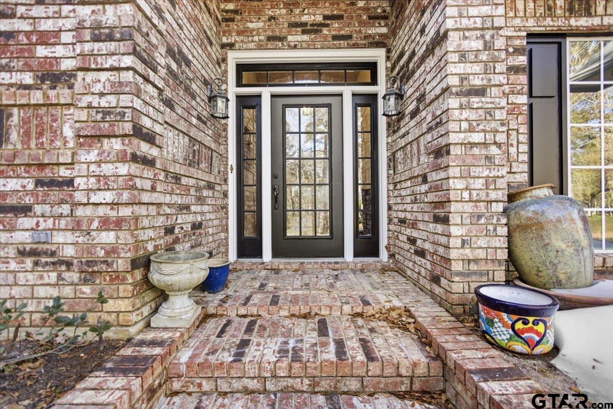 1336 Bridle Path Lane Hideaway, TX 75771 - Photo 15 of 48 a front view of a house with outdoor seating