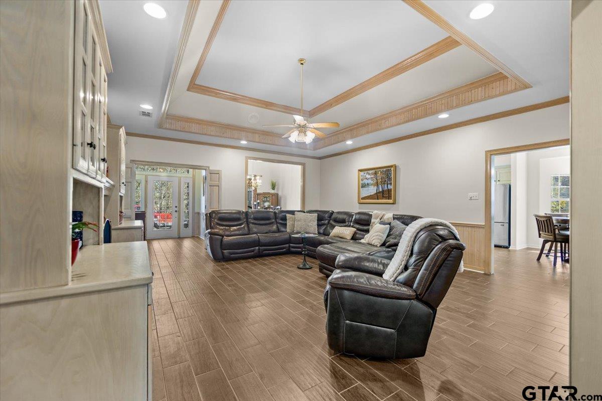 1336 Bridle Path Lane Hideaway, TX 75771 - Photo 21 of 48 a living room with furniture and a flat screen tv