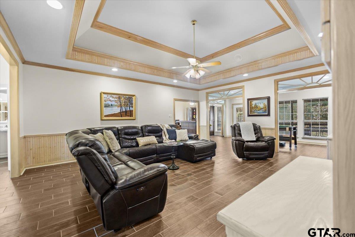 1336 Bridle Path Lane Hideaway, TX 75771 - Photo 22 of 48 a living room with furniture and a chandelier