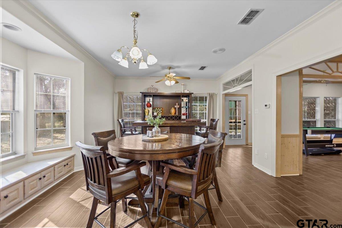 1336 Bridle Path Lane Hideaway, TX 75771 - Photo 40 of 48 a view of a dining room with furniture window and wooden floor